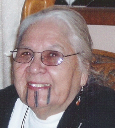 Aggie with new traditional "111" tattoo by New Zealand Maori elder, 2000