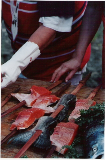 Salmon filets on traditional redwood skewers