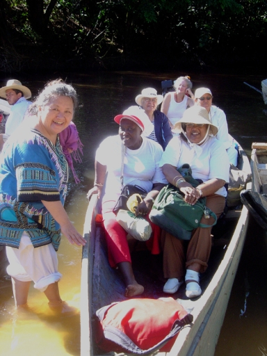 Clara Shinobu Iura welcomes Grandmothers to Mapia, Brazil, via the Amazon River, 2005